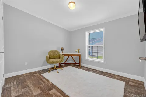 a workspace with furniture and window