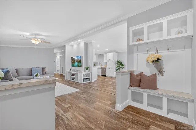 a living room with furniture and a table