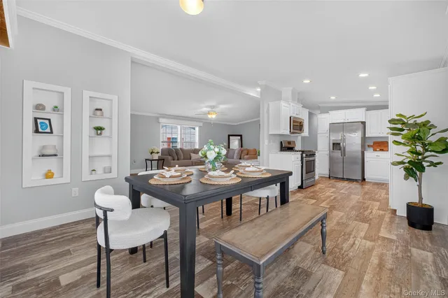 a view of a dining room with furniture