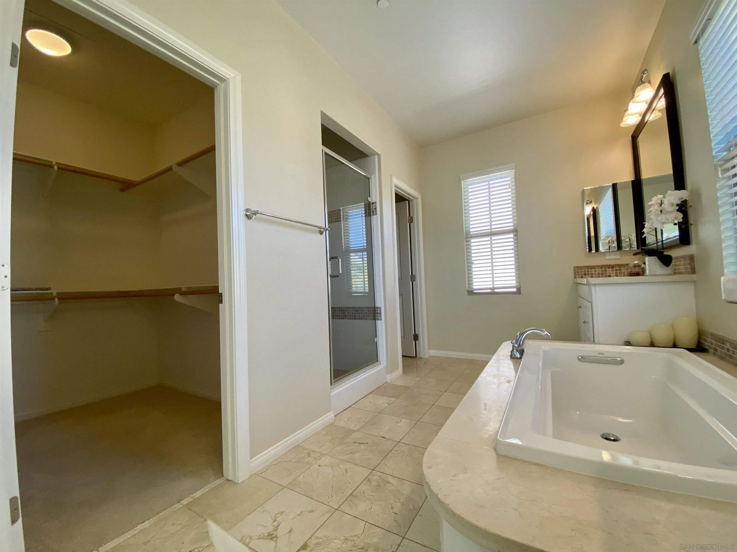 45 Diamond Irvine, CA 92620 - Photo 14 of 16 a bathroom with a tub and a sink