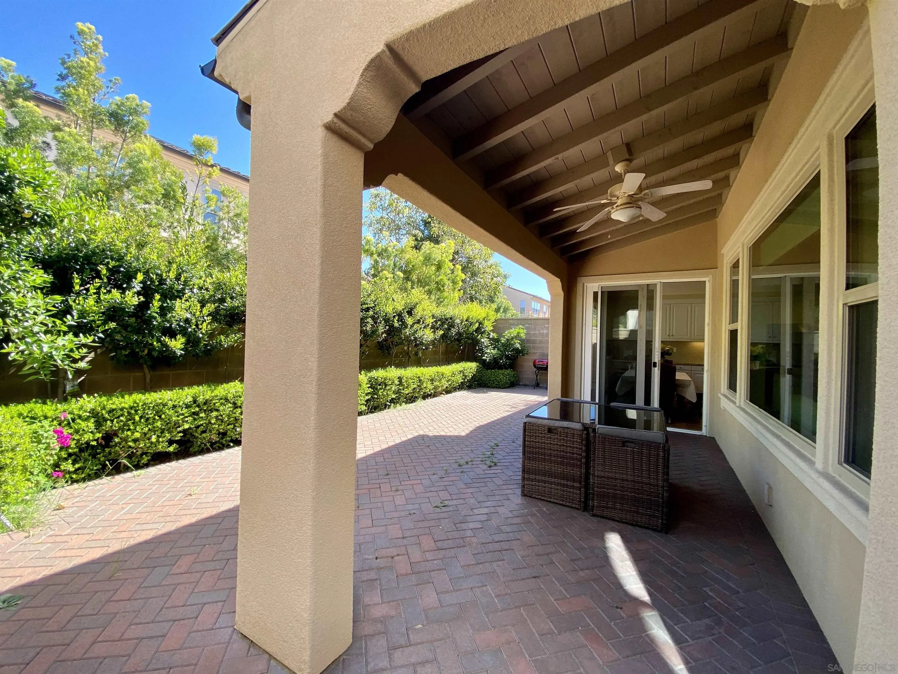45 Diamond Irvine, CA 92620 - Photo 16 of 16 a view of a porch with furniture and floor to ceiling windows