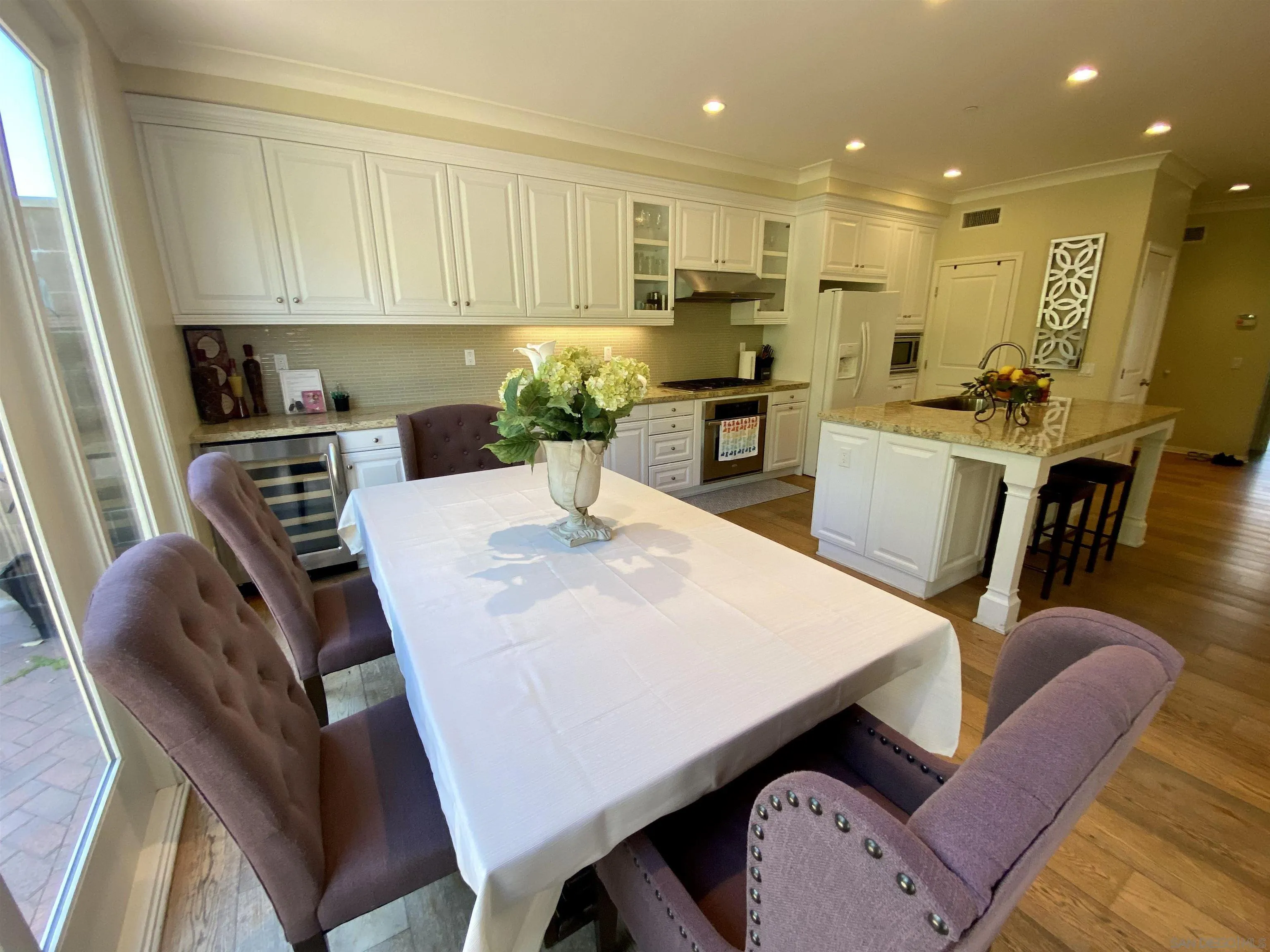45 Diamond Irvine, CA 92620 - Photo 7 of 16 a view of kitchen with dining table and chairs