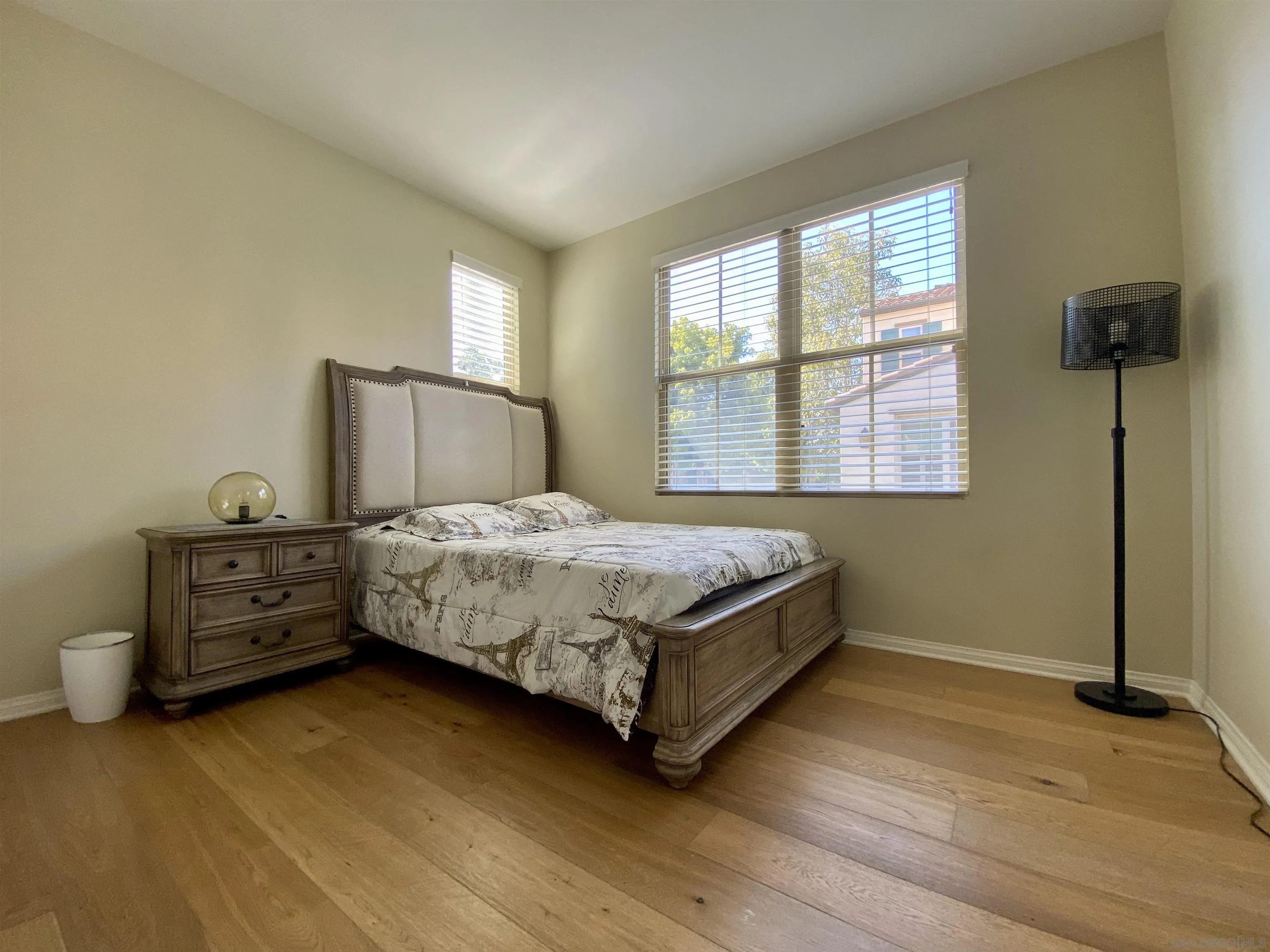 45 Diamond Irvine, CA 92620 - Photo 9 of 16 a bedroom with a bed dresser and a window