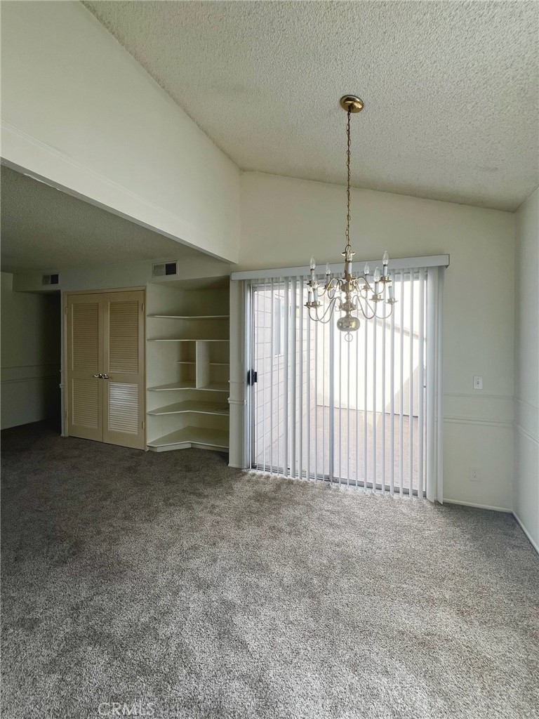 1350 Cabrillo Park Drive, Unit F Santa Ana, CA 92701 - Photo 14 of 32 a view of an empty room with a window