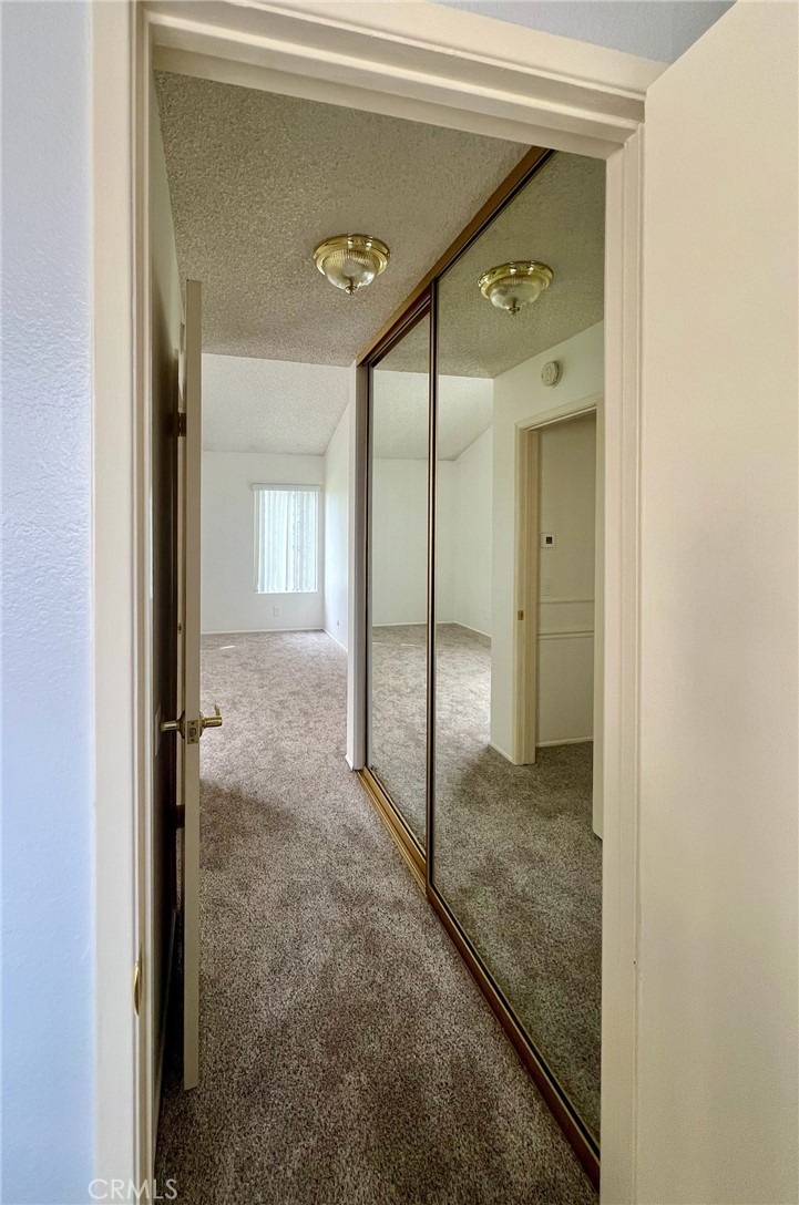 1350 Cabrillo Park Drive, Unit F Santa Ana, CA 92701 - Photo 21 of 32 a view of a hallway