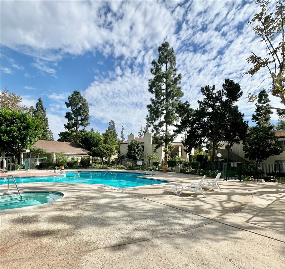 1350 Cabrillo Park Drive, Unit F Santa Ana, CA 92701 - Photo 27 of 32 a view of road with large trees