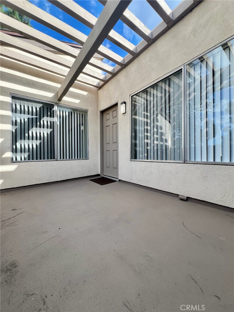 1350 Cabrillo Park Drive, Unit F Santa Ana, CA 92701 - Photo 7 of 32 a view of a porch