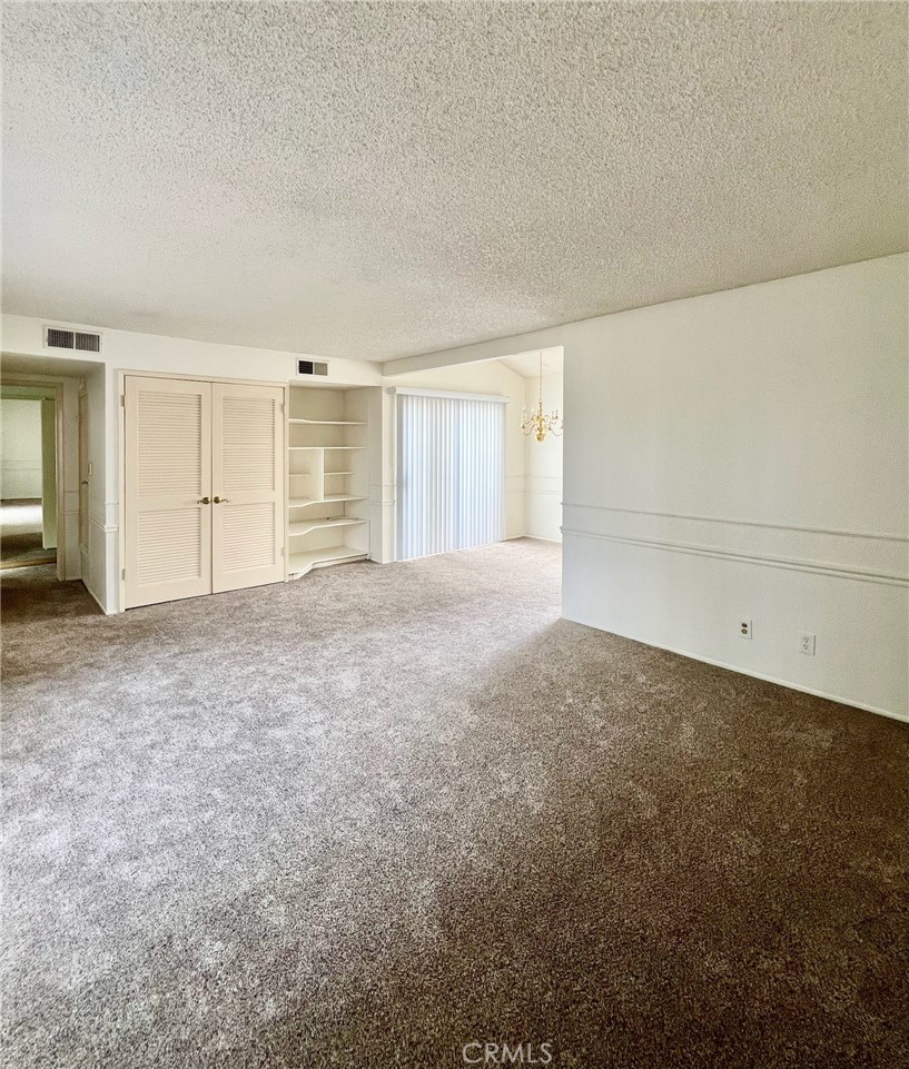 1350 Cabrillo Park Drive, Unit F Santa Ana, CA 92701 - Photo 10 of 32 a view of an empty room with a window