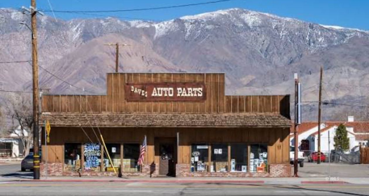 3780 Whitney Portal Road Lone Pine, CA 93545 - Photo 25 of 27 a view of a water fountain and a building in the background