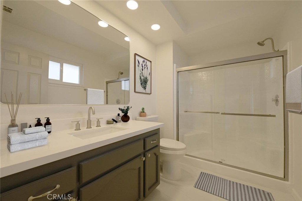 11724 Jamacha Road Apple Valley, CA 92308 - Photo 12 of 25 Primary Bathroom (Disclaimer: Some images have been digitally enhanced with virtual staging to illustrate potential room layouts and furnishings. Actual property condition and features may vary. Buyer to verify all information independently).