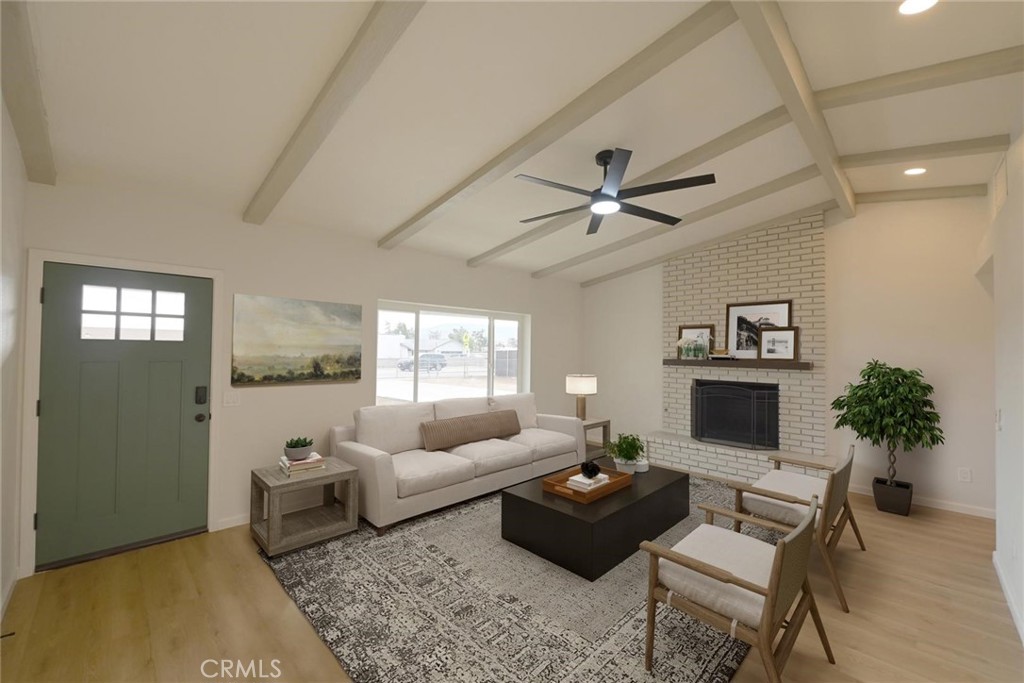 11724 Jamacha Road Apple Valley, CA 92308 - Photo 3 of 25 Living Room (Disclaimer: Some images have been digitally enhanced with virtual staging to illustrate potential room layouts and furnishings. Actual property condition and features may vary. Buyer to verify all information independently).