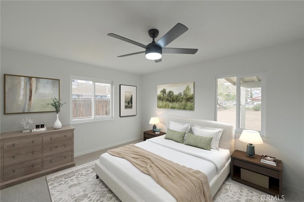 11724 Jamacha Road Apple Valley, CA 92308 - Photo 10 of 25 Primary Bedroom (Disclaimer: Some images have been digitally enhanced with virtual staging to illustrate potential room layouts and furnishings. Actual property condition and features may vary. Buyer to verify all information independently).