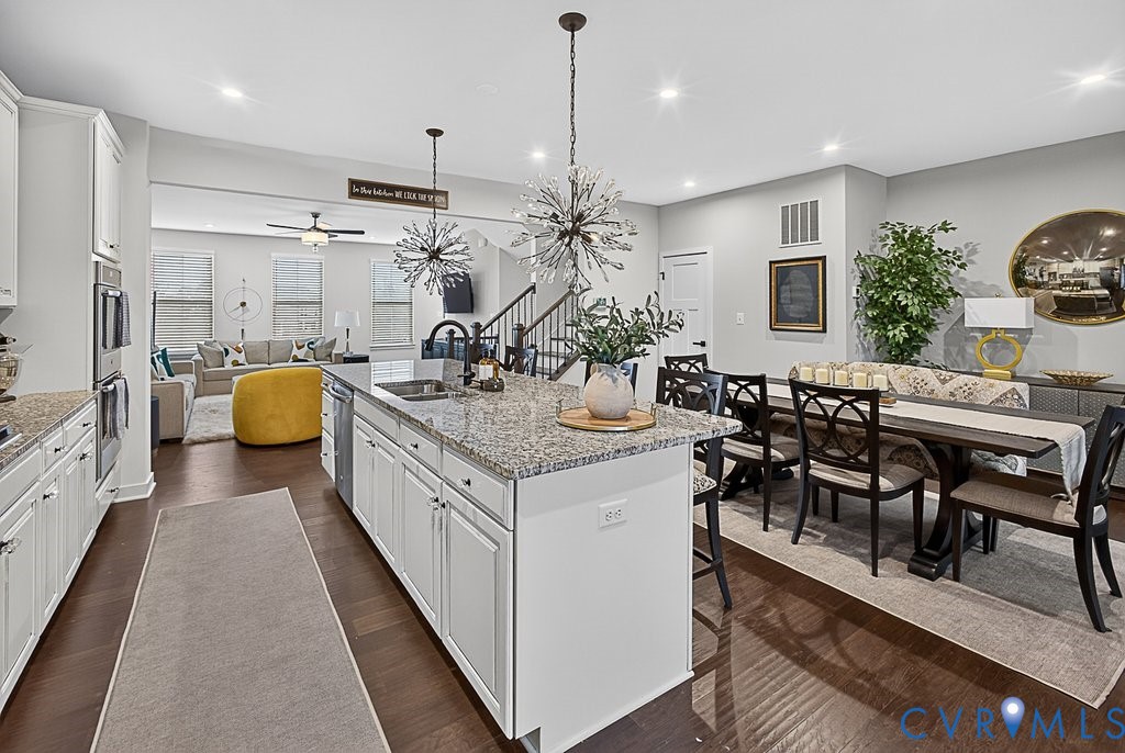 17976 Spotted Oak Road Dumfries, VA 22026 - Photo 7 of 52 Open-concept kitchen featuring an oversized island