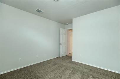 720 Taggart Trail Jarrell, TX 76537 - Photo 6 of 12 a view of an empty room