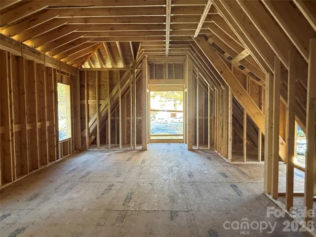 a view of a house with porch and wooden floor
