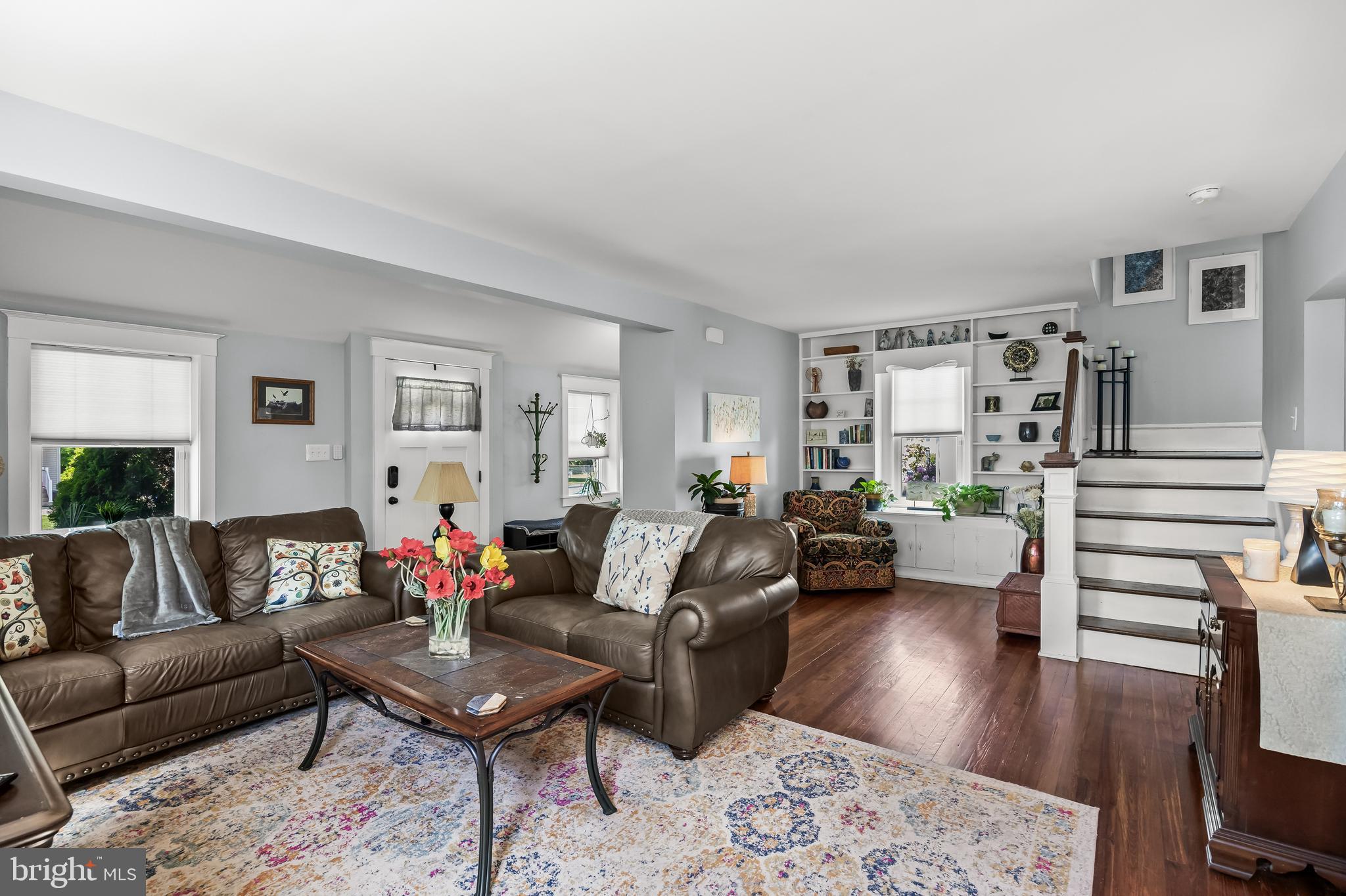 615 North Walnut Avenue Magnolia, NJ 08049 - Photo 8 of 40 a living room with furniture and wooden floor