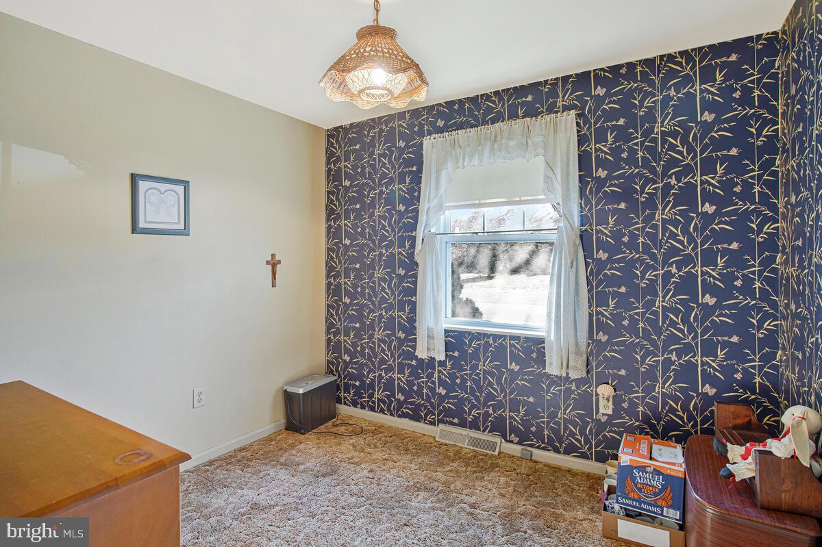 612 Fairmount Road Linthicum Heights, MD 21090 - Photo 23 of 46 a view of an empty room and window