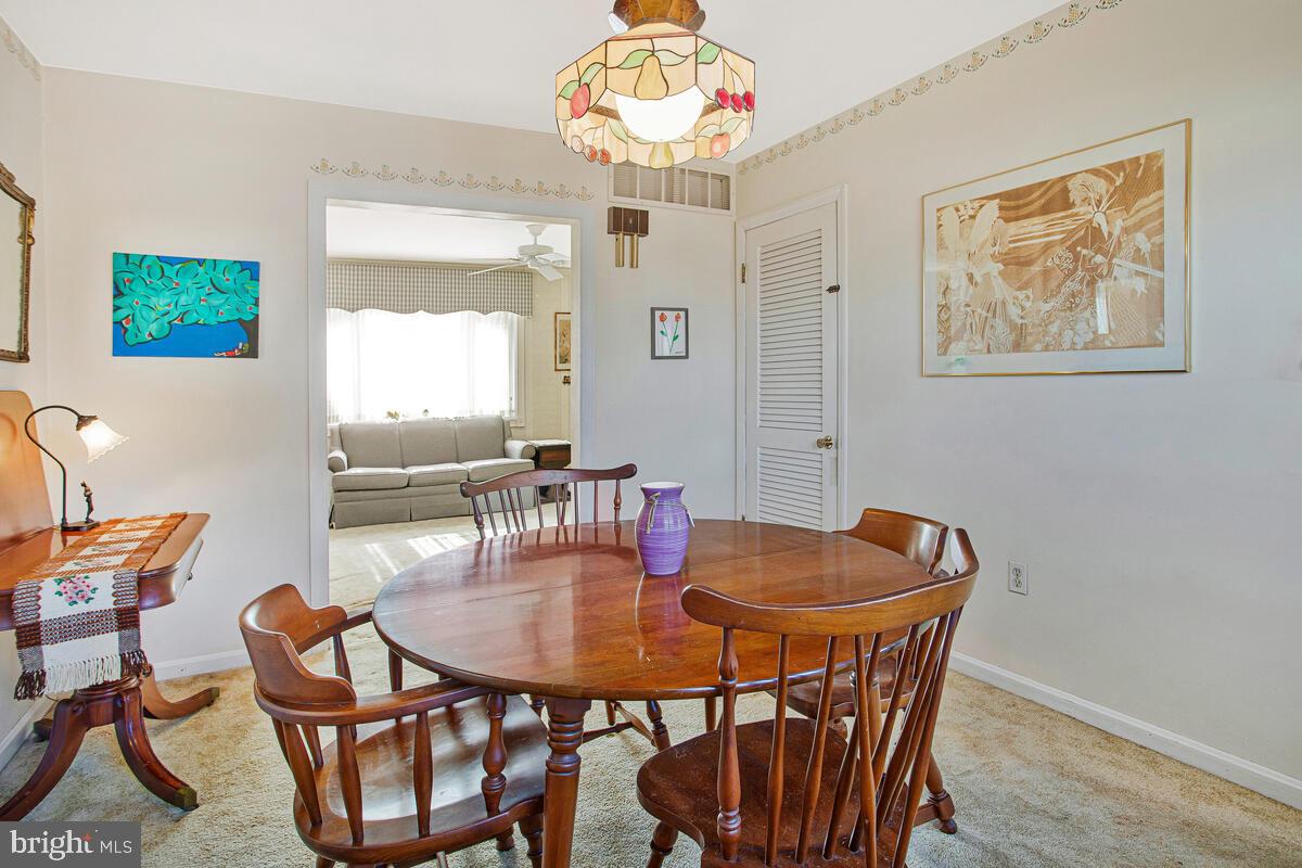 612 Fairmount Road Linthicum Heights, MD 21090 - Photo 10 of 46 a dining room with furniture and window