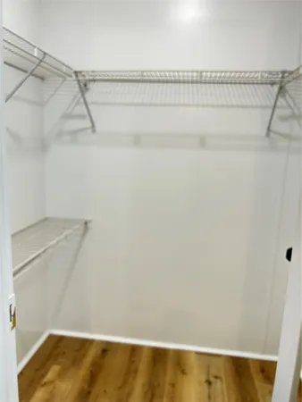 a view of a room with racks on the wall