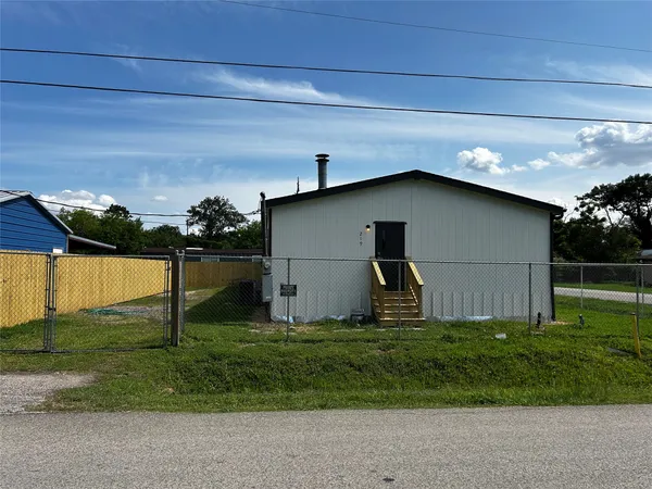 a house with garden in front of it