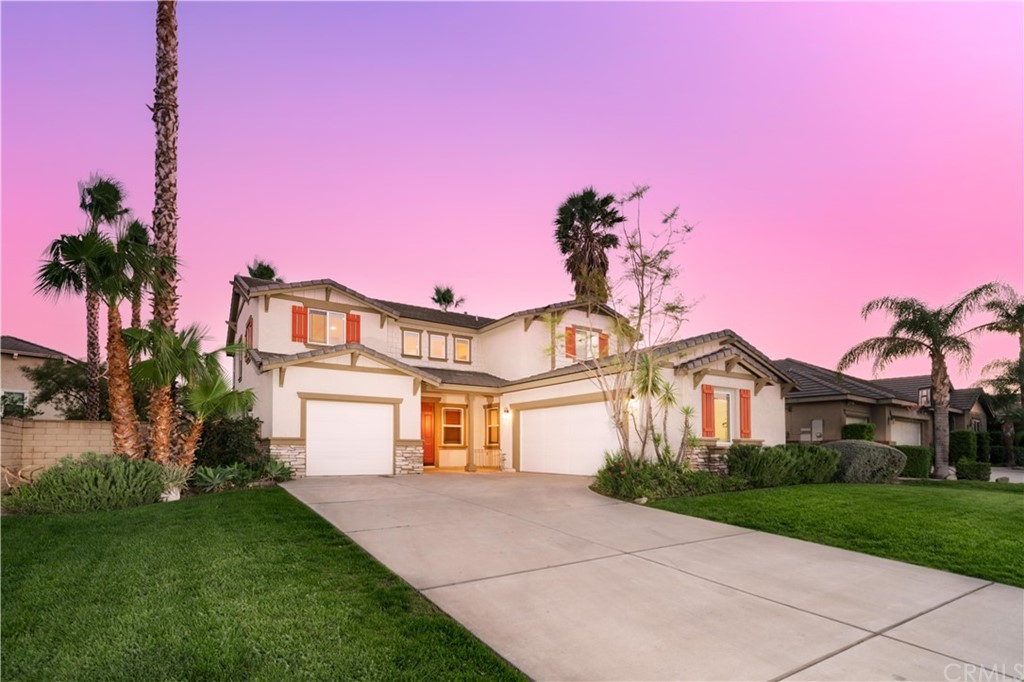13079 Colonial Drive Rancho Cucamonga, CA 91739 - Photo 1 of 1 a front view of a house with a yard and garage