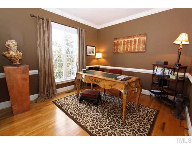 Formal living room currently being used as an office Living Room
