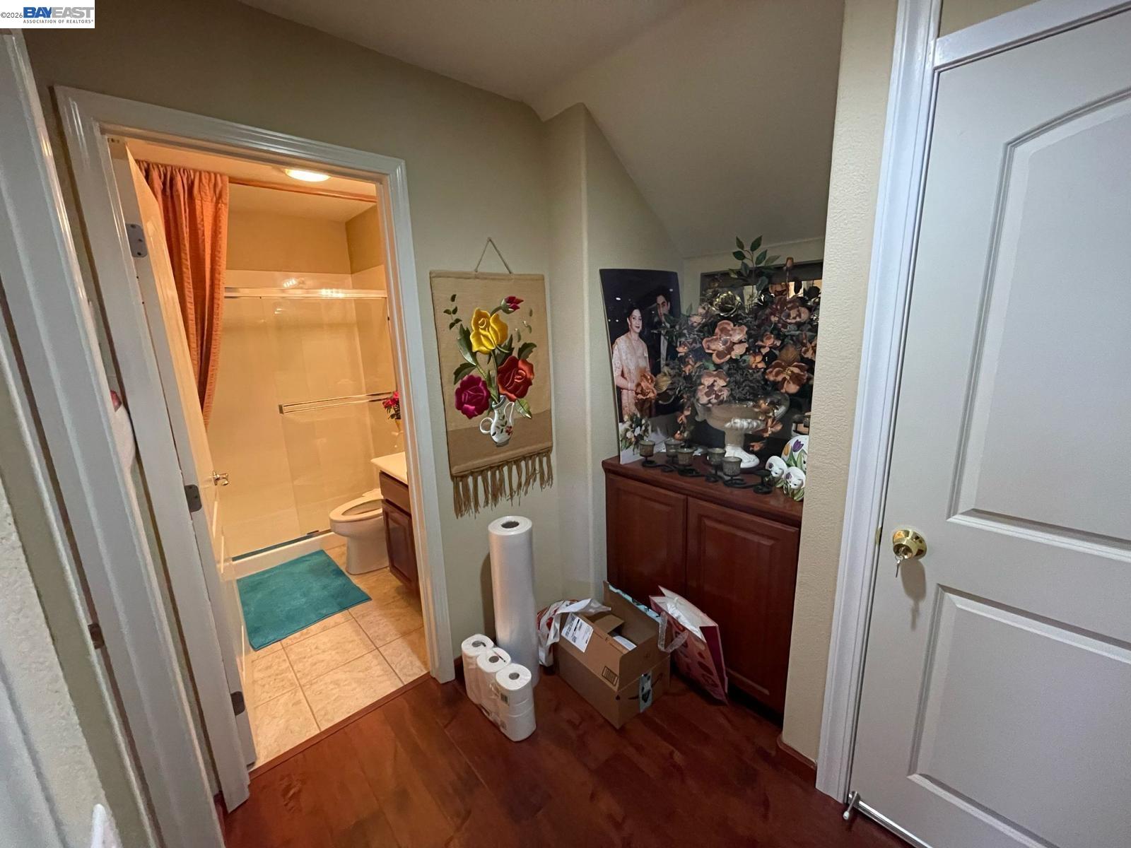 1013 Ridgeview Drive El Sobrante, CA 94803 - Photo 8 of 20 a view of a hallway with wooden floor and a livingroom view