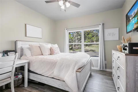 a balcony with furniture and wooden floor
