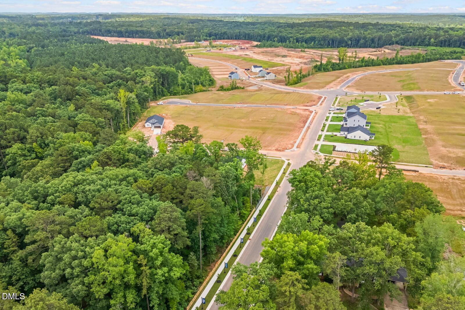 217 Rosewood Drive Sanford, NC 27330 - Photo 26 of 29 an aerial view of residential houses with outdoor space and river