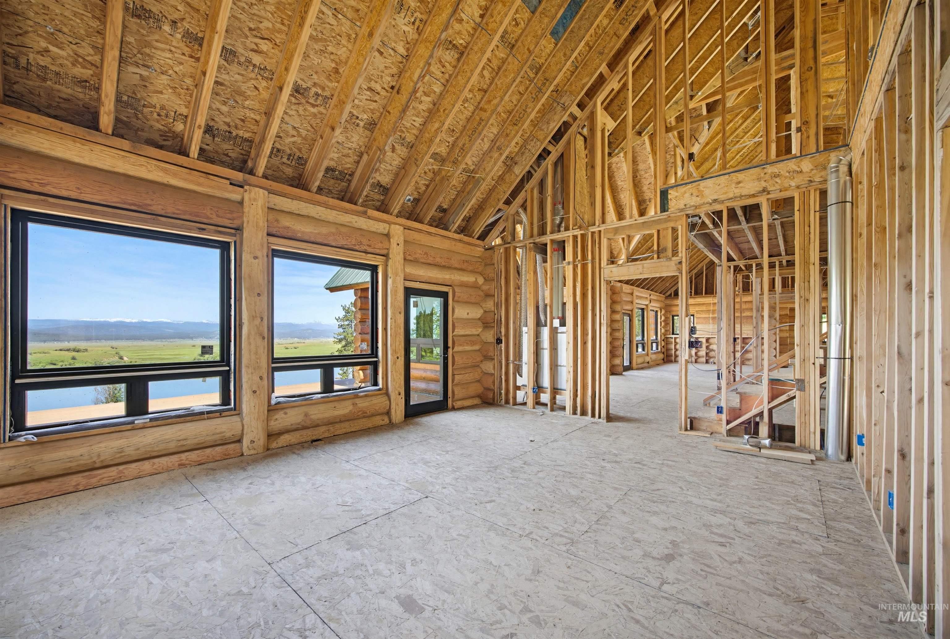 3322 Big Creek Road New Meadows, ID 83654 - Photo 22 of 50 Vaulted wooden ceilings with visible rafters complement the log-style wall construction