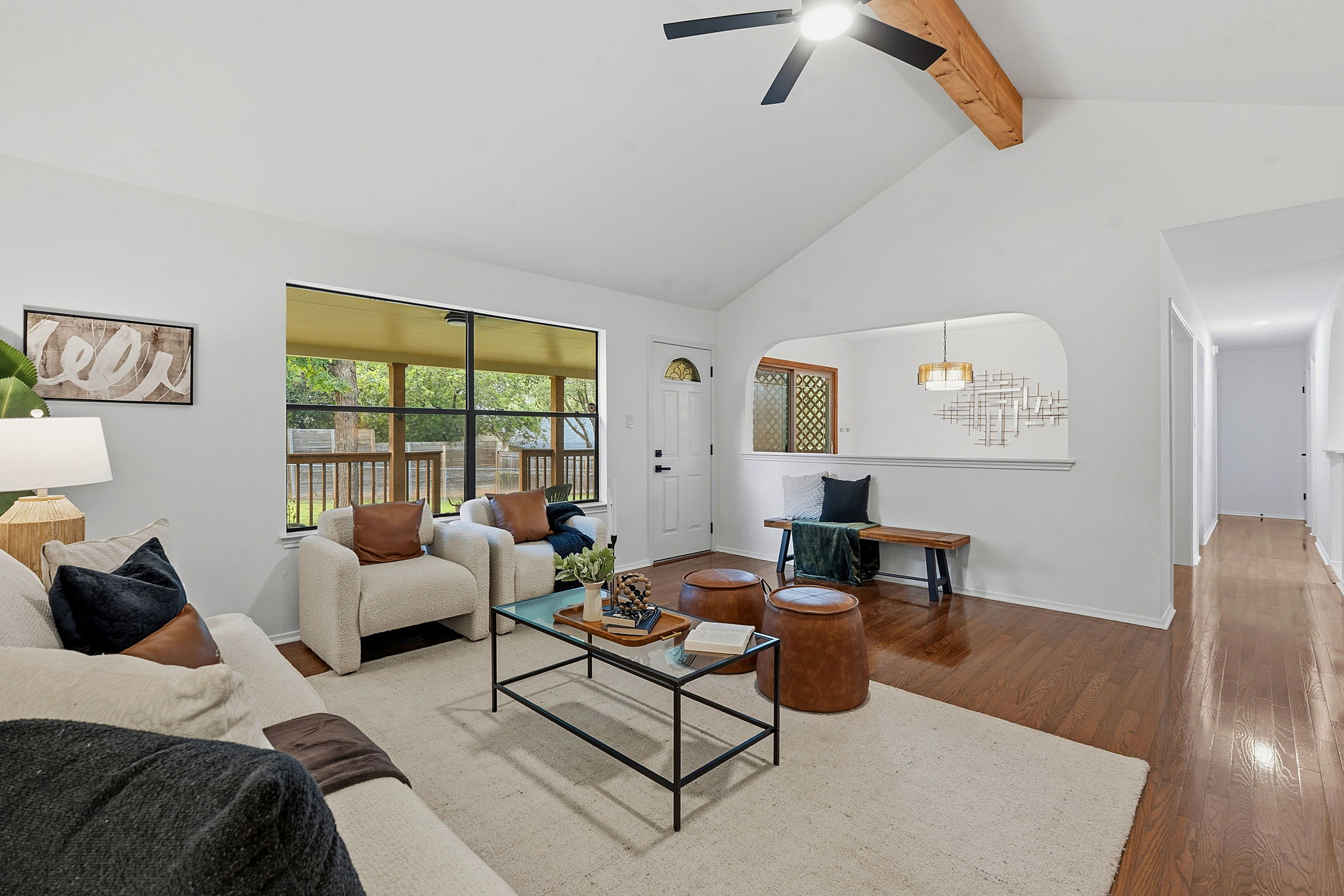 2702 Calabash Cove Austin, TX 78745 - Photo 8 of 40 a living room with furniture and a large window