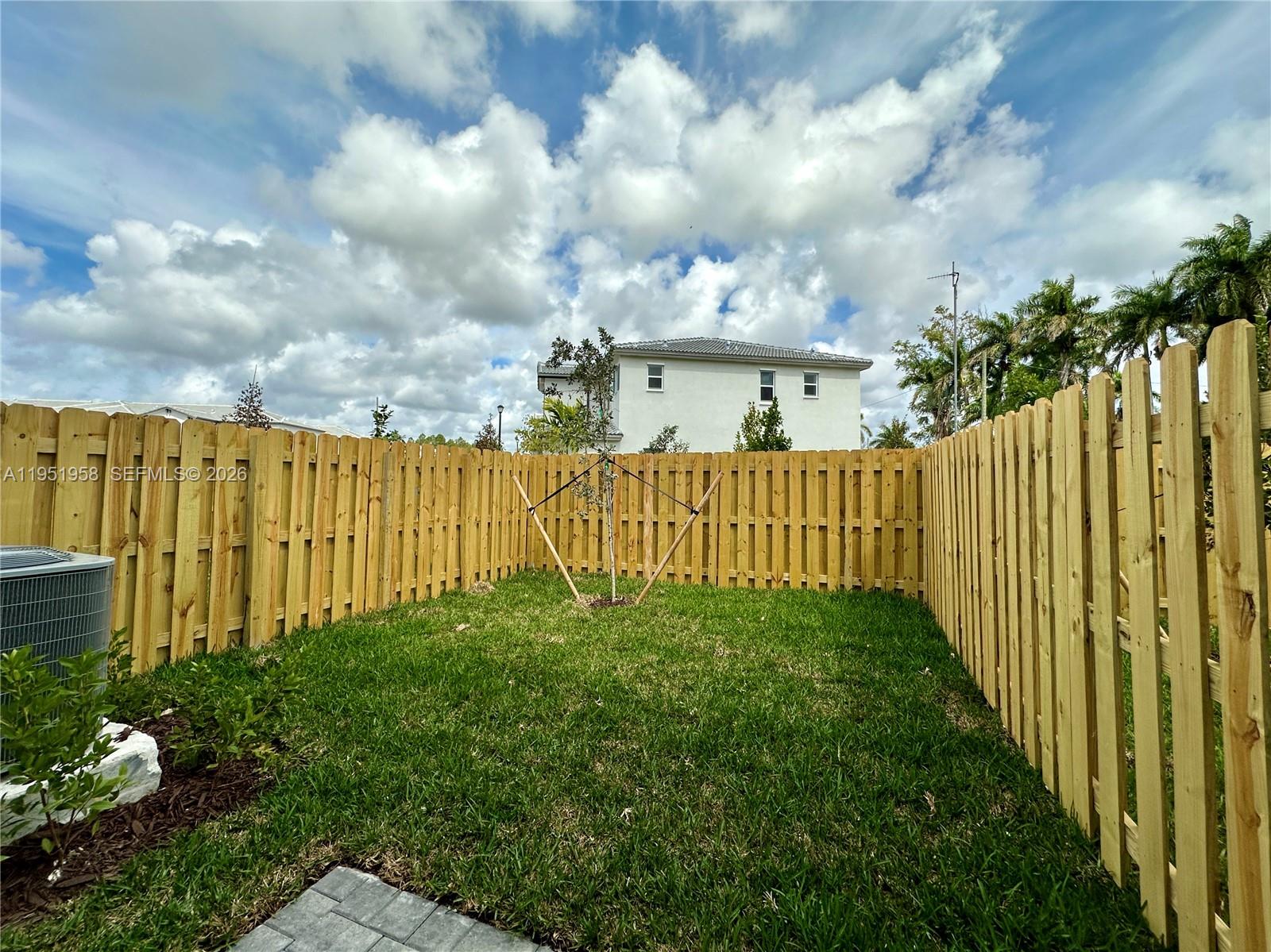 29229 Southwest 162nd Court Homestead, FL 33033 - Photo 27 of 27 a view of a garden with pathway