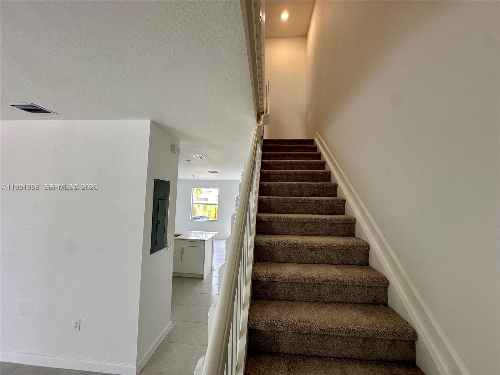 29229 Southwest 162nd Court Homestead, FL 33033 - Photo 7 of 27 a view of entryway and hall with wooden floor