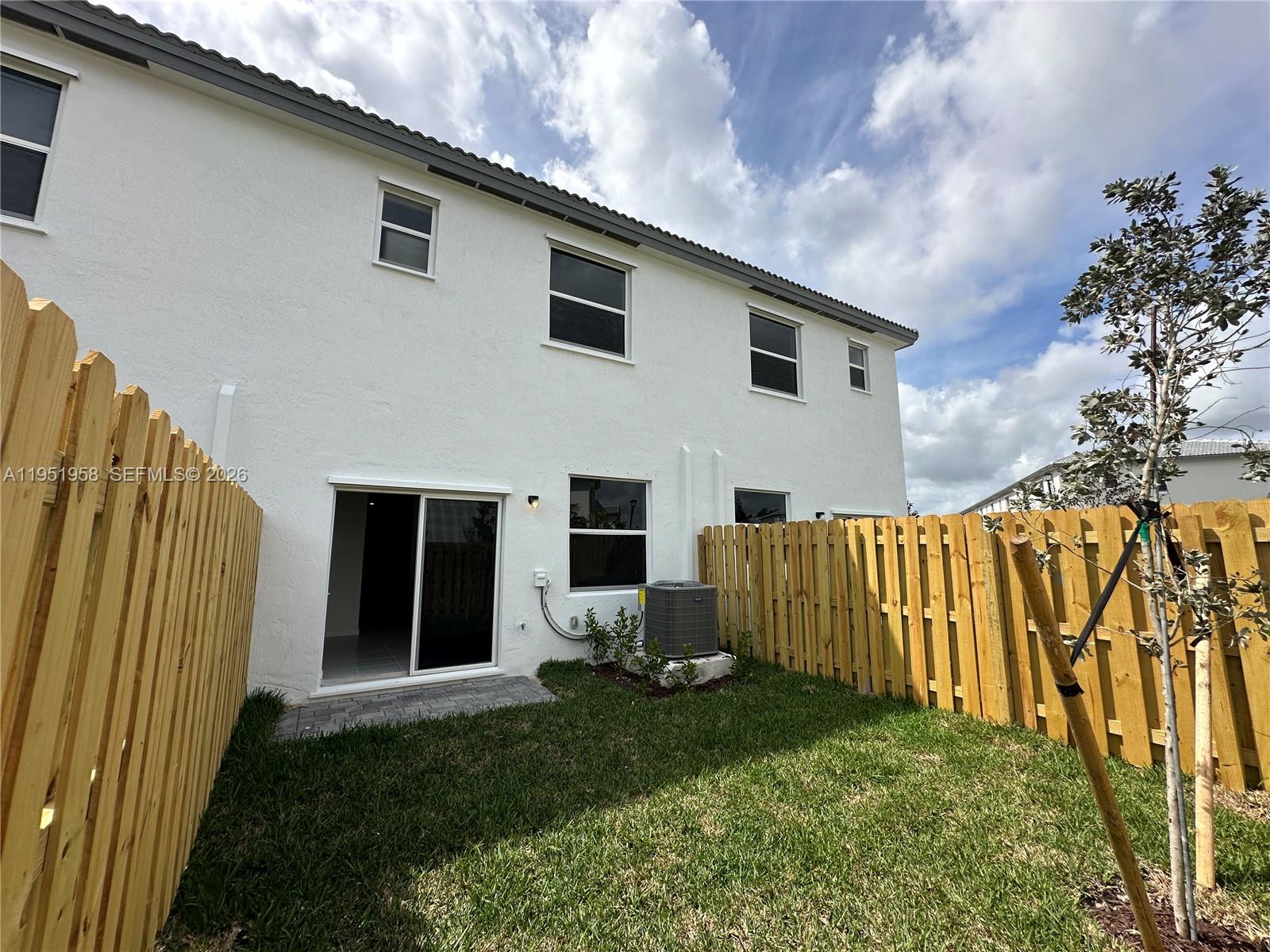 29229 Southwest 162nd Court Homestead, FL 33033 - Photo 9 of 27 a view of backyard with garden