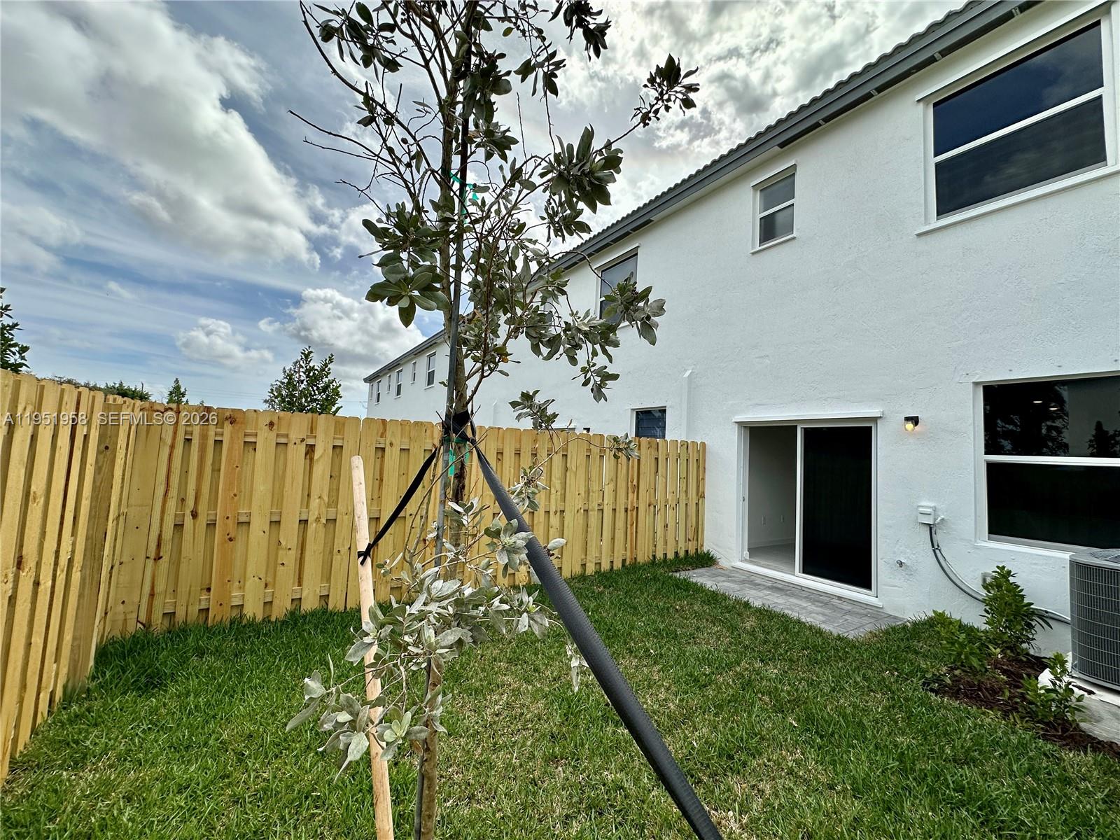 29229 Southwest 162nd Court Homestead, FL 33033 - Photo 10 of 27 a view of backyard with garden
