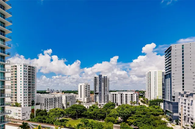 a view of a city with tall buildings
