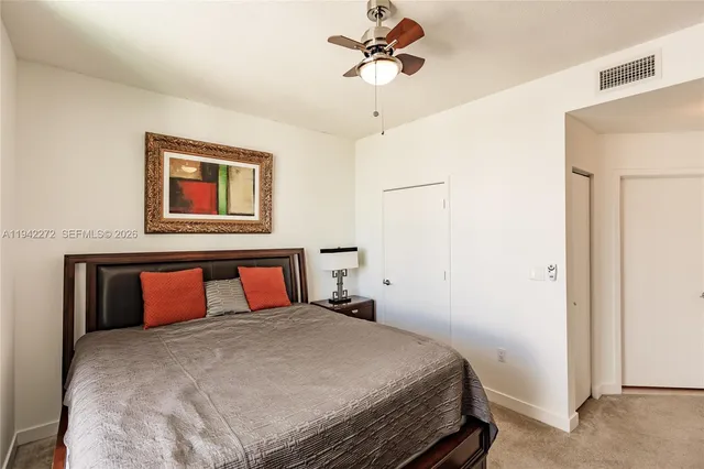 a bathroom with a sink a mirror and a shower