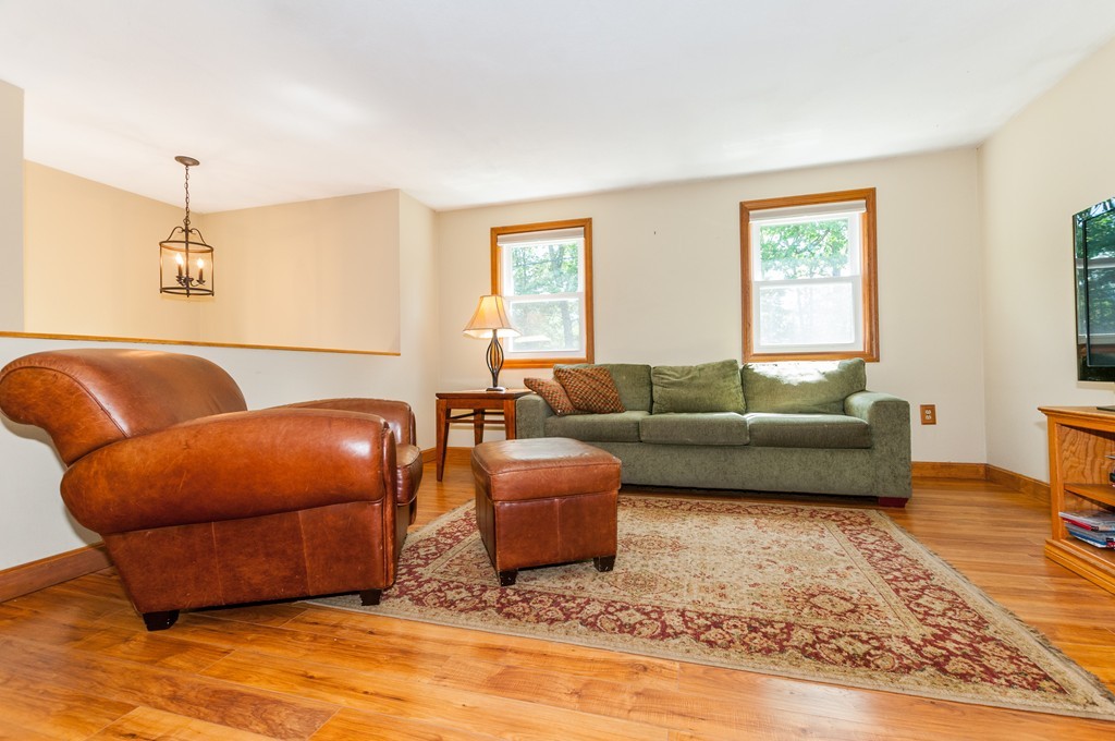 65 Curran Road North Attleboro, MA 02760 - Photo 3 of 19 a living room with furniture and a rug