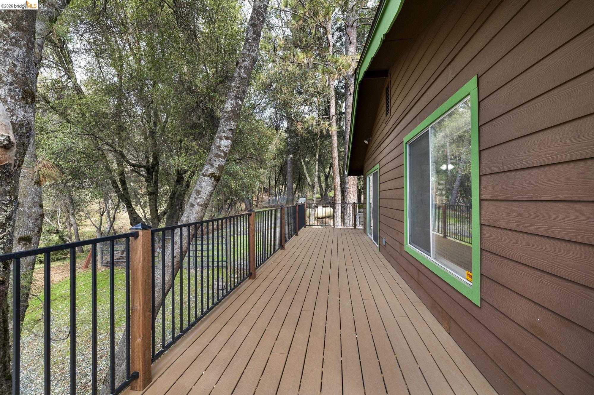 21550 Phoenix Lake Road Sonora, CA 95370 - Photo 34 of 50 a view of balcony with wooden floor and fence