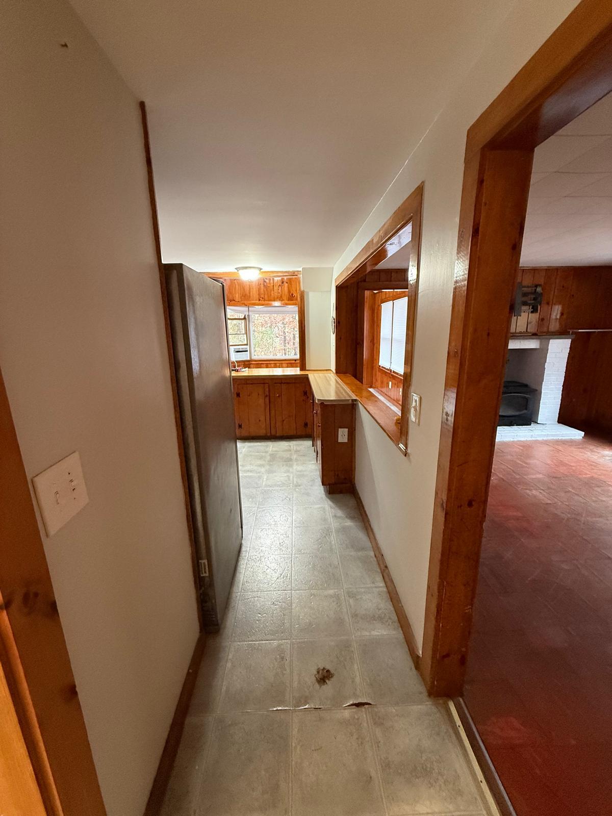 86 Lowell Road Mashpee, MA 02649 - Photo 12 of 18 a view of a hallway with furniture