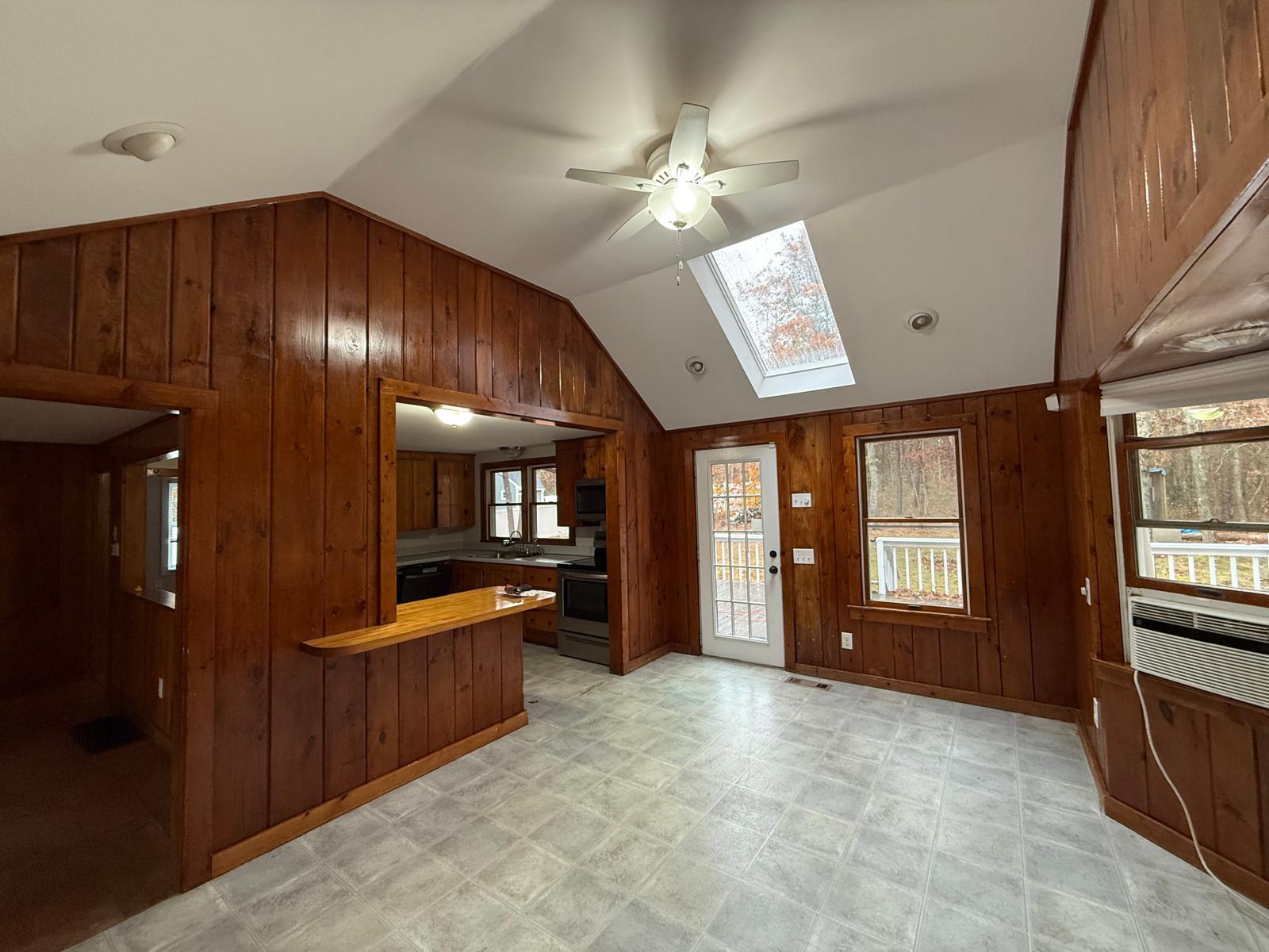 86 Lowell Road Mashpee, MA 02649 - Photo 8 of 18 a view of a hallway with furniture and windows