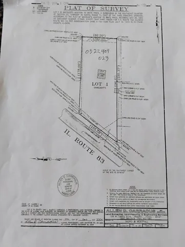 a room with white cabinets and white wooden floor