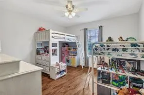 a living room with lots of furniture and a chandelier