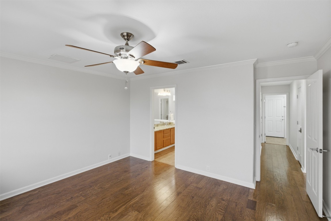 508 Lark Street Leander, TX 78641 - Photo 16 of 40 The primary bedroom is your retreat at the end of the day and has it's own private ensuite bathroom.