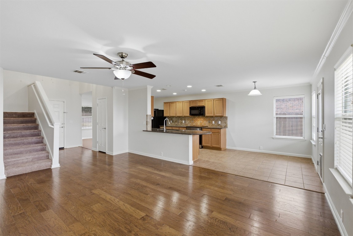 508 Lark Street Leander, TX 78641 - Photo 2 of 40 The interior was recently painted. This large family room with wood floors is ready for your furnishings.
