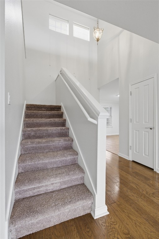 508 Lark Street Leander, TX 78641 - Photo 22 of 40 Stairway leading upstairs. Notice this has a 2-story entryway for appeal?