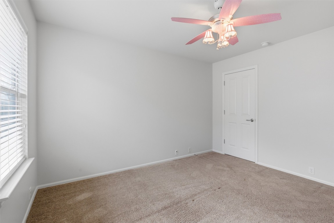 508 Lark Street Leander, TX 78641 - Photo 26 of 40 Another view of this secondary bedroom with smaller walk-in closet.
