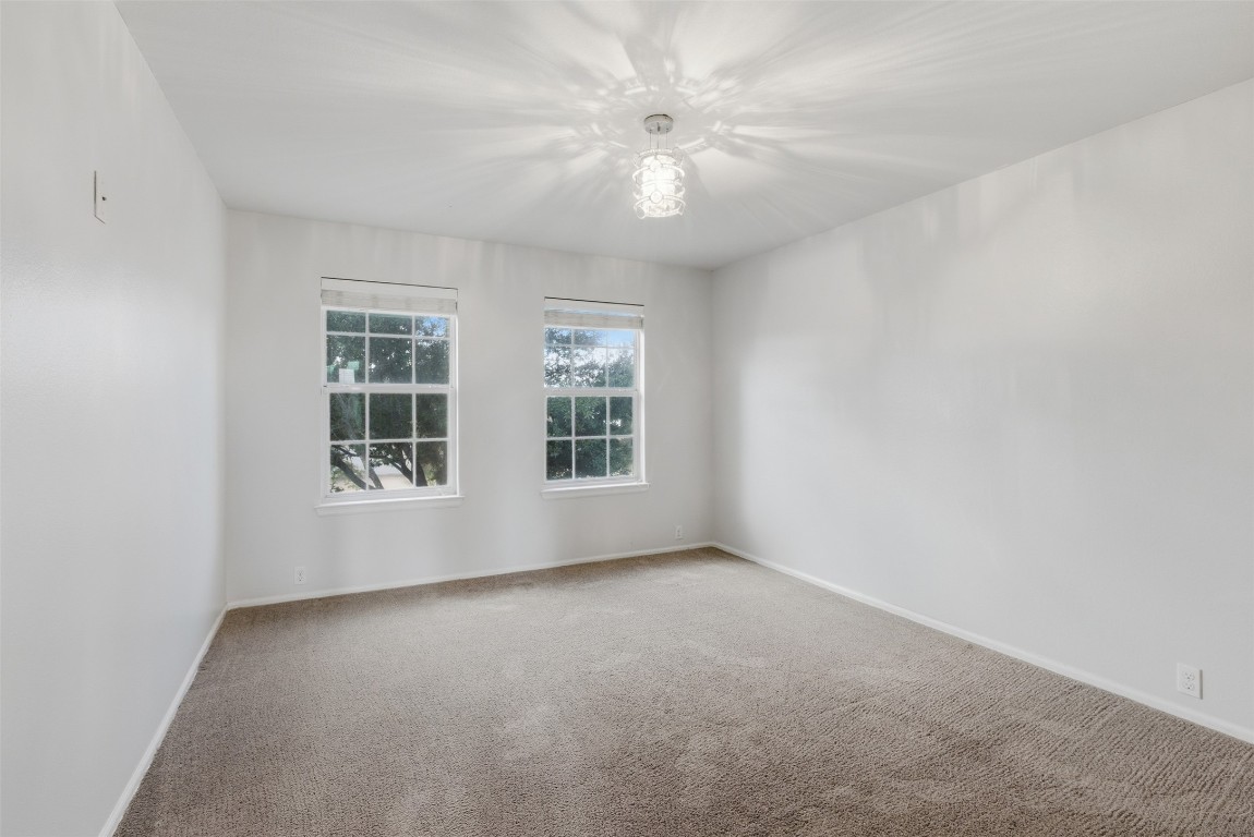 508 Lark Street Leander, TX 78641 - Photo 30 of 40 The fourth bedroom up sits off to itself on the other side.