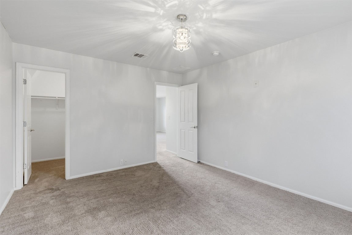 508 Lark Street Leander, TX 78641 - Photo 31 of 40 Another view of the fourth bedroom with walk in closet.