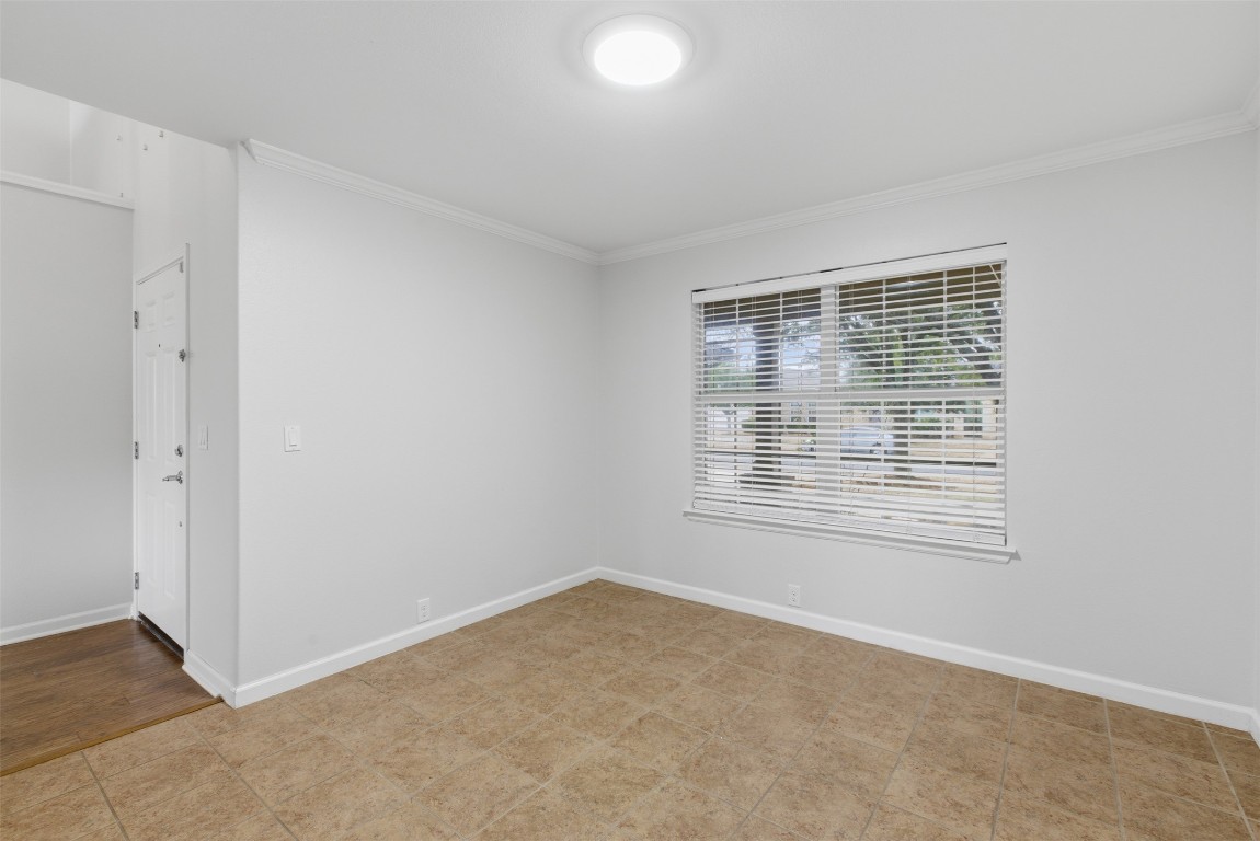508 Lark Street Leander, TX 78641 - Photo 8 of 40 The formal dining sits at the front of the home just off the entryway and could be used as a home office. Notice the crown molding?